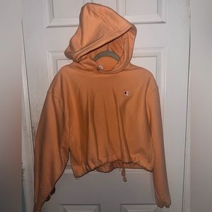 Medium, sinched, cropped orange CHAMPION sweatshirt